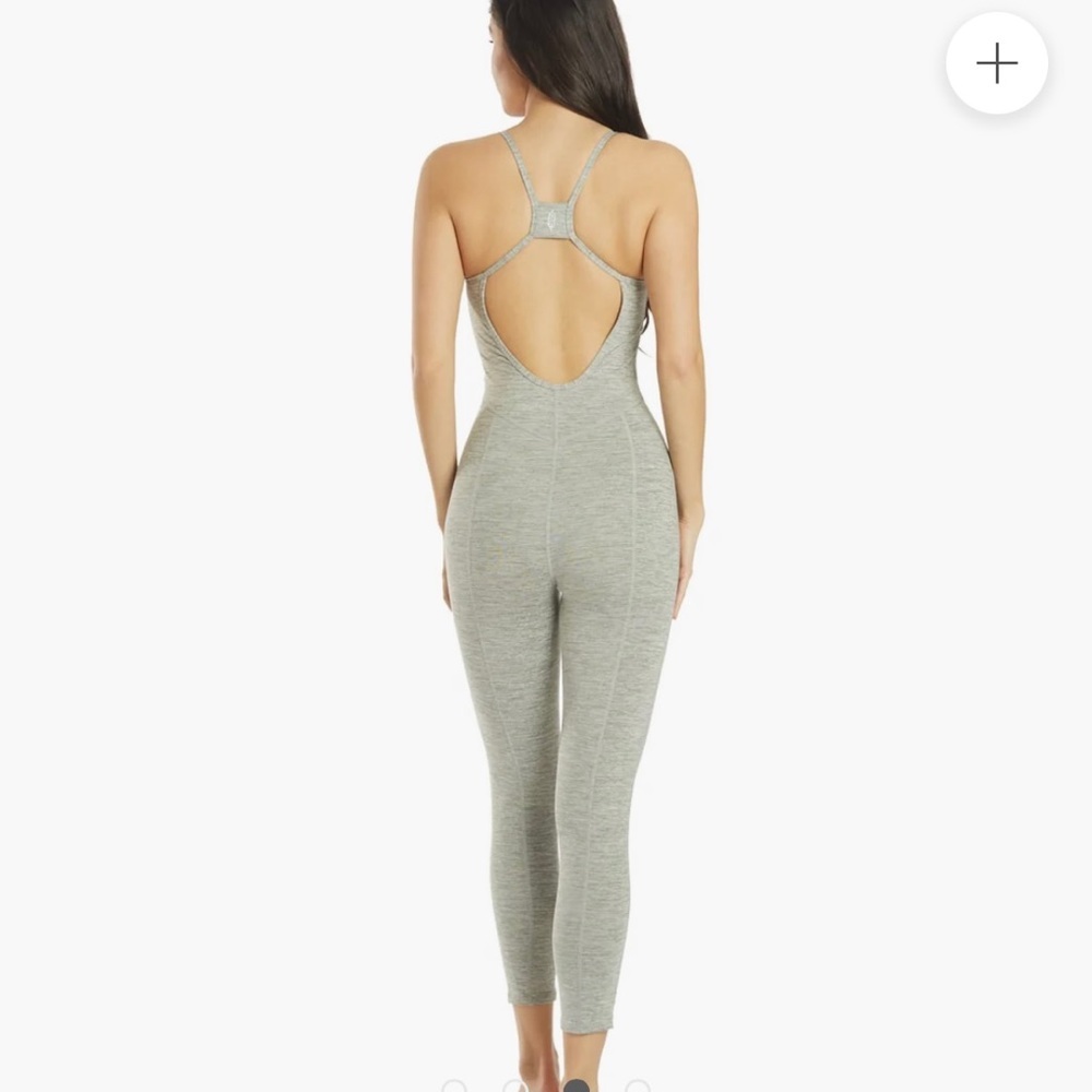 NWT FREE PEOPLE MOVEMENT ASHFORD SIDE TO SIDE PERFORMANCE JUMPSUIT SIZE XS